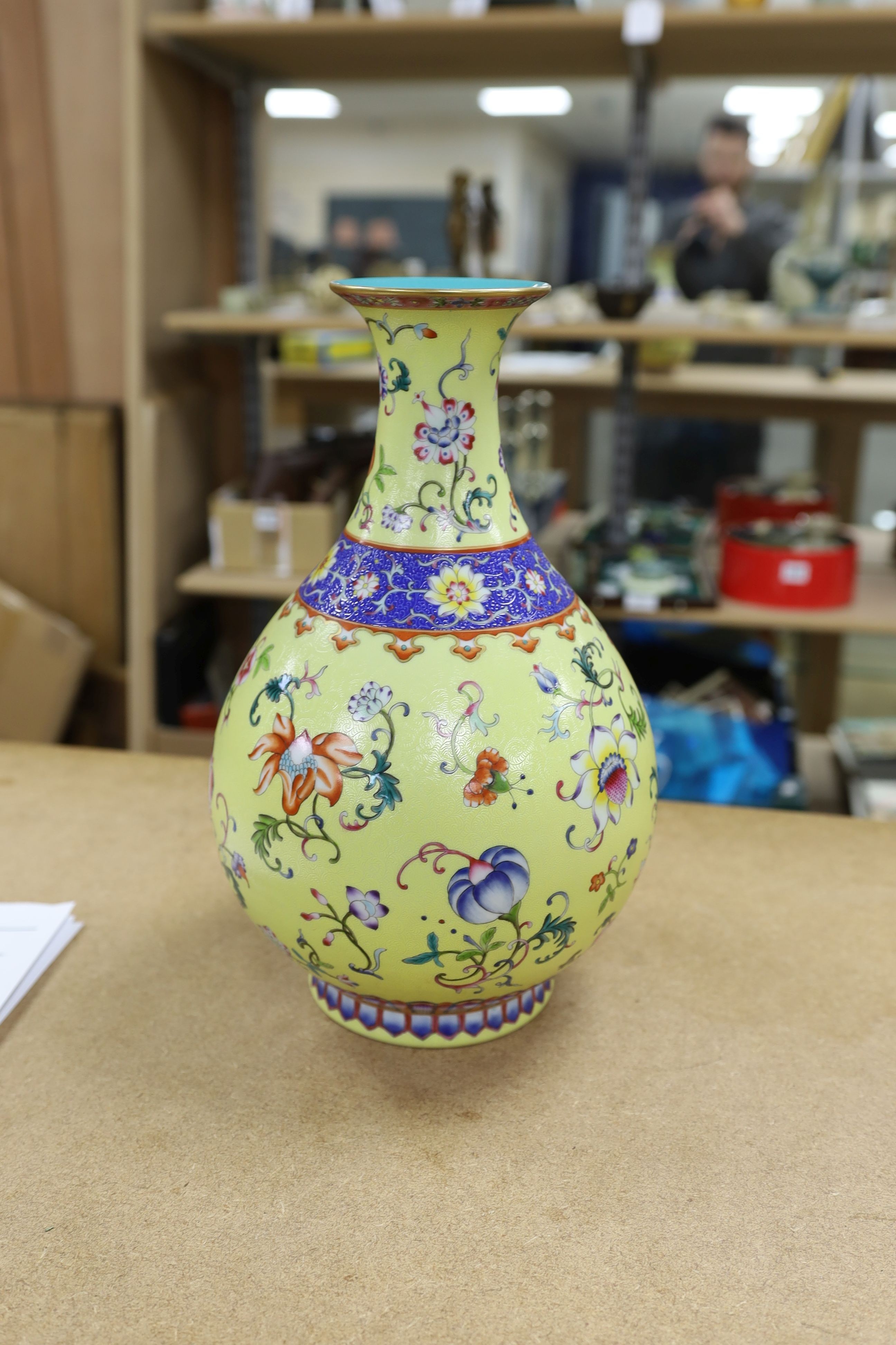 A Chinese yellow-ground porcelain pear-shaped vase, 34cm